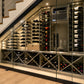 Glass-door wine cooling cabinet with rows of wine bottles and illuminated interior racks