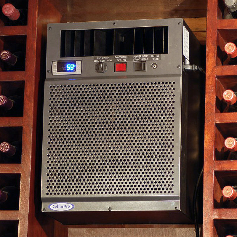 Built-in wine cooling unit installed in a wood wine cellar cavity