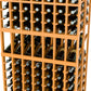 Close-up view of light wood wine bottle display rack filled with bottles