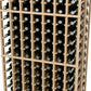 Angled view of a light wood 7-column wine rack with multiple bottle rows