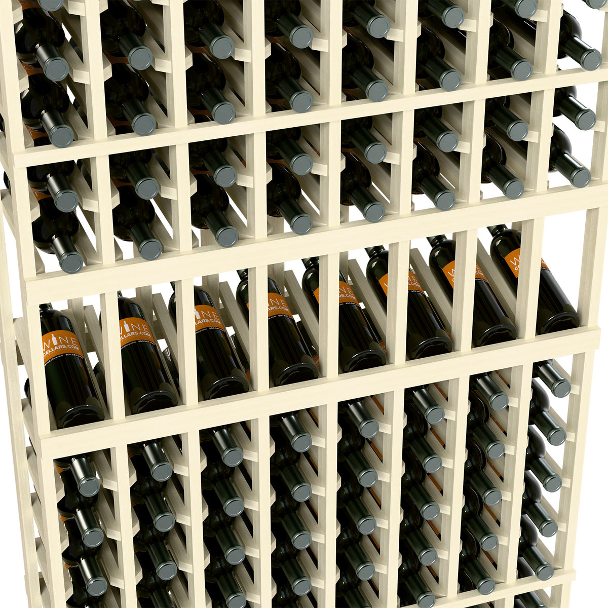 Close-up of white wine rack compartments holding dark bottles with silver caps