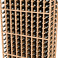Wine rack grid with bottle slots; light wood frame holding wine bottles.