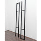 Floating wall frame set with tall black rails and horizontal dividers