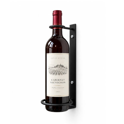 Wall-mounted wine bottle perch, black metal backplate with bottle ring and red-capped bottle