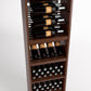 Front view of tall wine storage cabinet with bottle rails and multiple rows of bottle bins