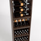 Wood wine display cabinet with bottle rails, middle bottle rack, and lower cubby holders