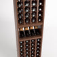Wood wine bottle rack with four columns, front bottle storage plus lower grid for bottles
