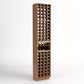 Compact tall light wood wine rack with four-column bottle slots and a center bottle tray shelf