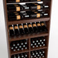 Close view of wooden wine rack with bottle rails and square bin compartments