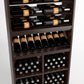 Wood wine rack display with bottle rails, angled row shelf, and wine bottle bins