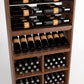 Detailed view of wine bottle rails and stacked wine bins with bottle necks in each cell