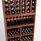 Medium wood wine rack close-up showing bottle cubbies, angled bottles, and two-tier bins