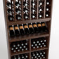 Wine rack close-up with bottle slots, front display shelf, and grid cubbies for bottles.