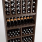 Dark wood wine rack close-up showing bottle holders, glassware tray, and storage cubbies.