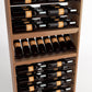 Close-up of wine bottle rack with horizontal rails and front bottle holder tray