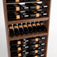 Close-up of wine bottle rack interior with stacked bottle rows and rail supports