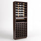 Dark wood wine rack cabinet with bottle rails at top, wine display shelf, and cellar bottle cubbies