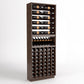Wood wine rack cabinet with top bottle rails, black bottle cradles, and cubby storage