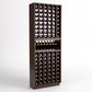 Tall wine bottle display rack with slotted bottle storage and horizontal shelf