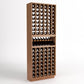 Freestanding wood wine bottle display rack with grid openings and tiered storage shelves