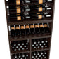 Close-up of dark wood wine display with bottle slots, decanter rack, and wine glass storage