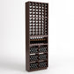 Dark wood wine rack with 6 columns: top bottle holders, middle display, and cubby bins.