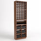 Wood wine bottle rack with 6 columns, display cubbies, and stacked storage bins