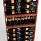 Wood wine rack with rows of labeled bottles and a front shelf holding additional bottles