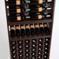 Wood wine rack close-up with horizontal bottle rails, arched display shelf, and cellar bottle storage