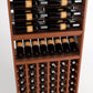 Wood wine rack showing stacked bottle slots with lower cubby compartments