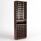 Dark wood wine rack cabinet with top bottle rails and front cubby storage for bottles