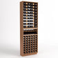 Light wood wine rack cabinet with bottle rails, display shelf, and front cellar bottle cubbies