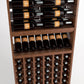 Light wood wine rack close-up with horizontal bottle rails, display shelf, and front cellar cubbies