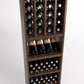 Walnut-toned wine rack showing bottle grid compartments, bottle display shelf, and row storage