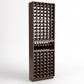 Dark brown wood wine bottle cellar rack with bottle slots and a center bottle display