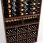 Wood wine rack interior close-up with bottle rails and bottle cubby bins
