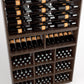 Wood wine rack showing bottle rails, middle shelf rows, and multiple square corker-style bins