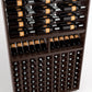 Dark wood wine rack with top bottle rails and glass bottle cubbies in vertical rows
