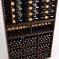 Close-up view of wine rack cabinet with top bottle rails and lower grid cubby storage