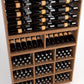 Wood wine storage display with upper bottle rails and lower cubby compartments