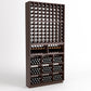 Tall dark wood wine rack with bottle slots, lower cubby bins, and display shelves