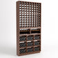 Tall dark wood wine rack with front bottle slots and cubby bins for bottles