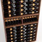 Wood wine bottle display unit with rows of bottles across top, middle, and bottom