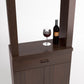 Wine tasting cabinet with mirror shelf, wine bottle, and stemmed glass on bar top
