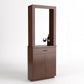 Wine tasting cabinet with mirror panel and lower storage cabinet doors