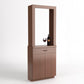 Wine tasting cabinet with mirror panel and lower storage cabinet doors in warm wood