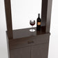 Cabinet-style wine tasting station close-up: serving ledge with wine glass and bottle