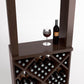 Wood wine tasting station close-up with wine glass and bottle on top and wine racks below.