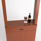 Light brown wood cabinet tasting station with drawer and doors, wine bottle and glass