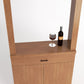 Light wood wine tasting cabinet with open top ledge, wine glass and bottle